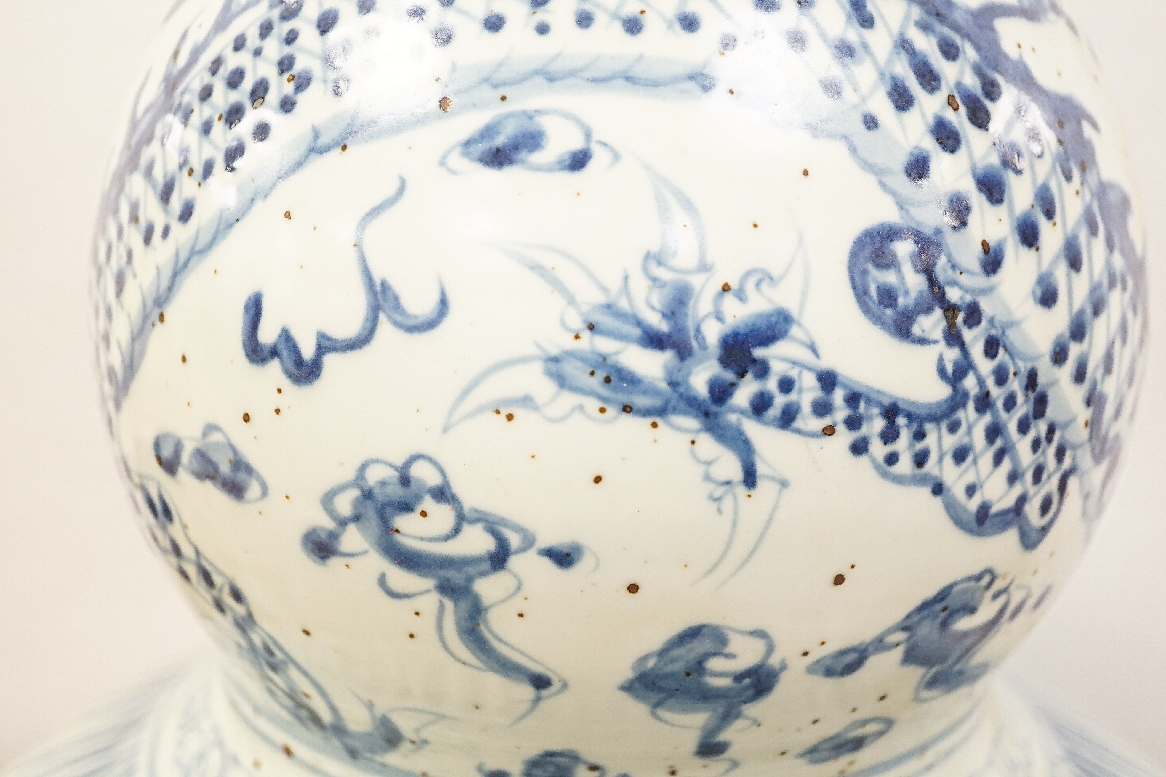 A large Chinese blue and white 'dragon' double gourd vase, 64cm high and an Annamesse style blue and white crackle glaze jar